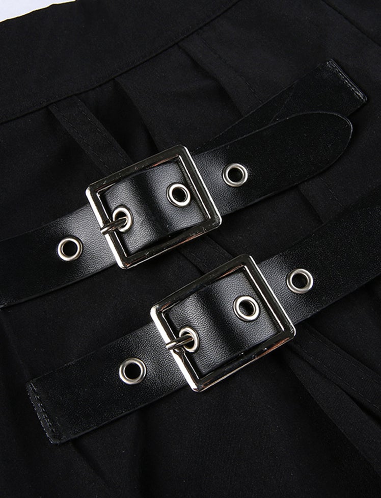 Irregular pleated skirt with black leg loops
