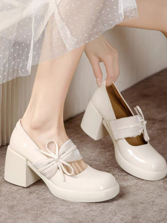 Ribbon-tie Mary Jane Pumps in White