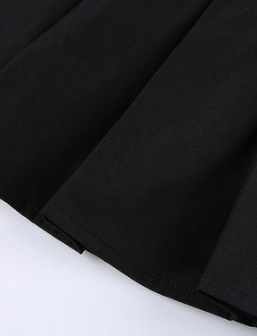 Irregular pleated skirt with black leg loops